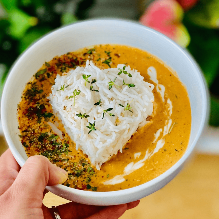 Heart-shaped rice with butter masala in a bowl